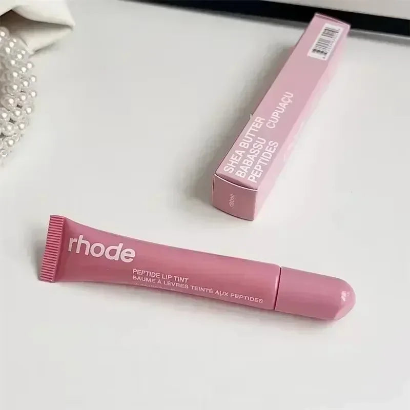 Lip balm case close up ribbon detail texture beauty accessory